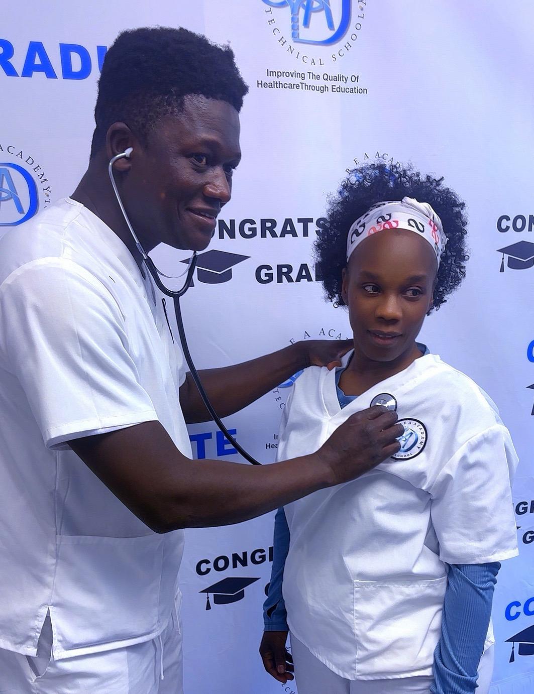 A Drea Academy student practising patient assessment with a stethoscope